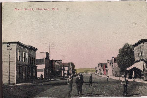 Historic postcard view looking down Main Street in Florence, Wisconsin.